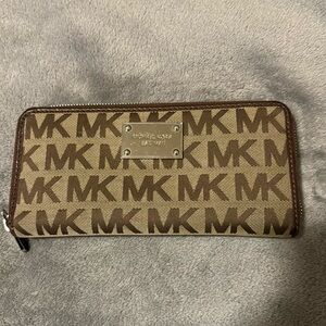 Michael Kors zip wallet great condition. Size visible in photos.